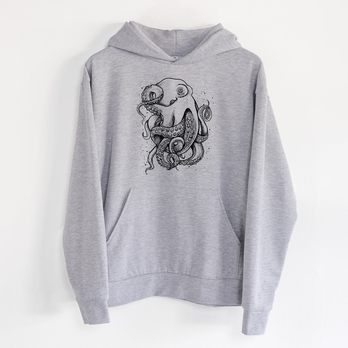 Octopus Vulgaris - Common Octopus - Statement Midweight Hoodie in Heather Grey, hanging on a white wall, with a front kangaroo pocket and no drawcords.
