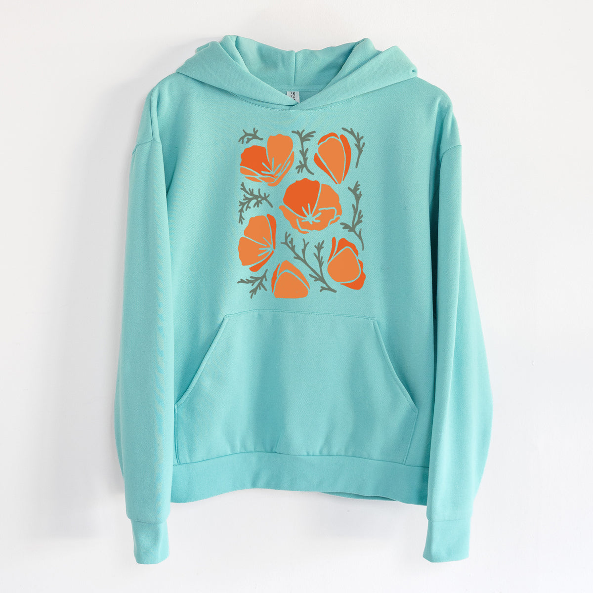 Poppy Vibes - Statement Midweight Hoodie in Seafoam, hanging on a white wall, with a front kangaroo pocket and no drawcords.