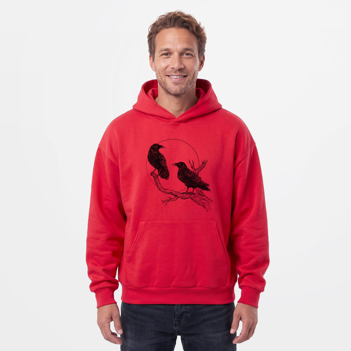 Male model wearing the Midnight Ravens - Statement Midweight Hoodie.