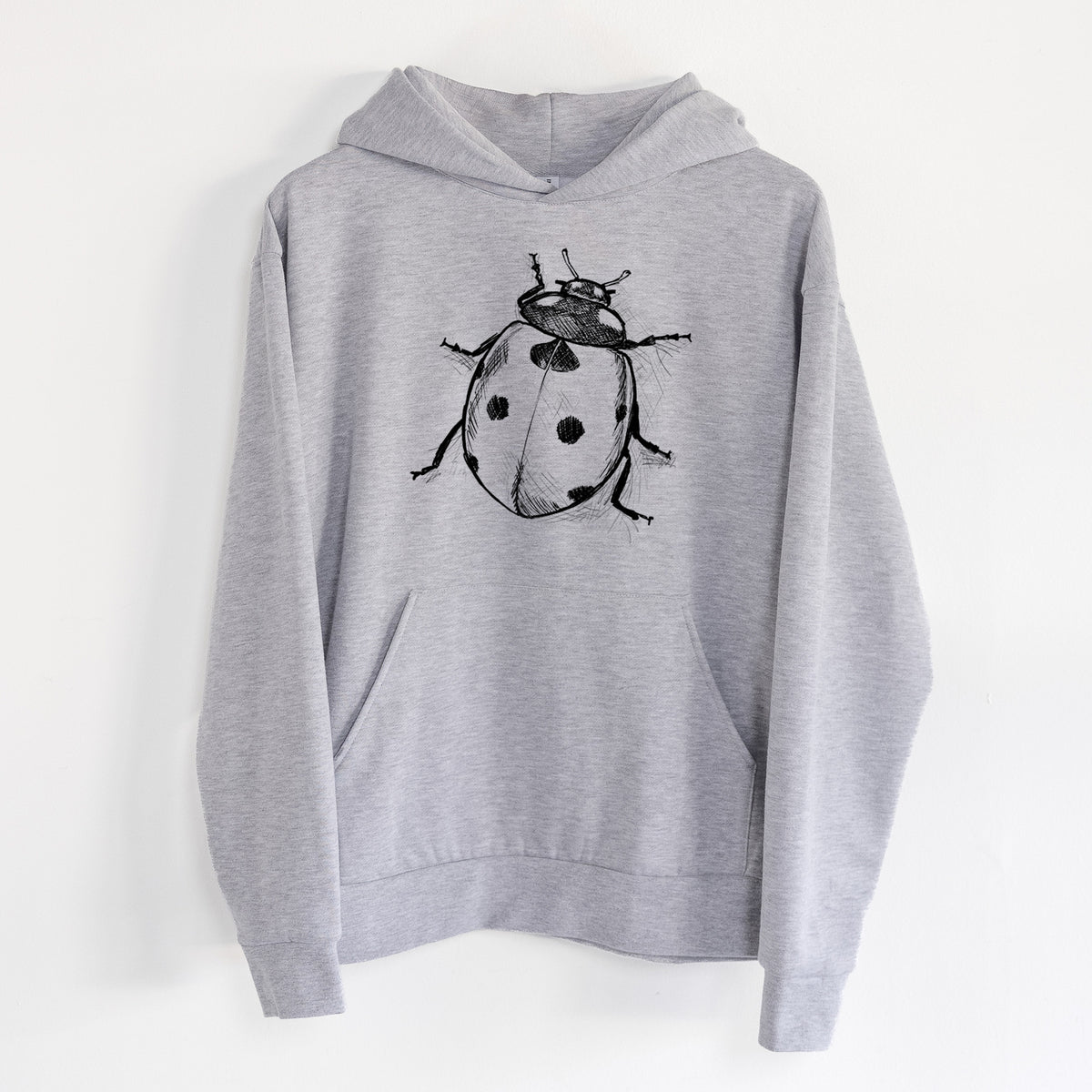Coccinella septempunctata - Seven-spot Ladybird Ladybug - Statement Midweight Hoodie in Heather Grey, hanging on a white wall, with a front kangaroo pocket and no drawcords.
