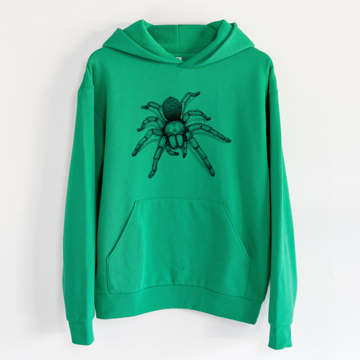 Desert Blonde Tarantula - Aphonopelma chalcodes - Statement Midweight Hoodie in Kelly Green, hanging on a white wall, with a front kangaroo pocket and no drawcords.