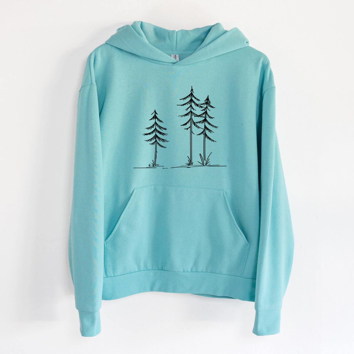 Three Pines - Statement Midweight Hoodie in Seafoam, hanging on a white wall, with a front kangaroo pocket and no drawcords.