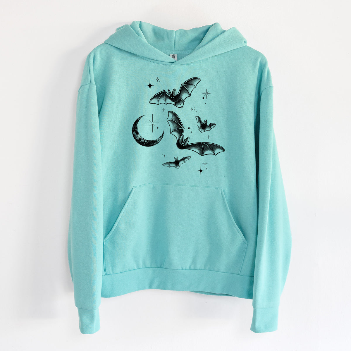 Townsend's Bats Under a Crescent Moon - Statement Midweight Hoodie in Seafoam, hanging on a white wall, with a front kangaroo pocket and no drawcords.