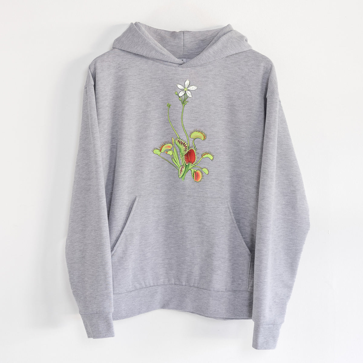Colorful Carnivorous Venus Fly Trap - Statement Midweight Hoodie in Heather Grey, hanging on a white wall, with a front kangaroo pocket and no drawcords.