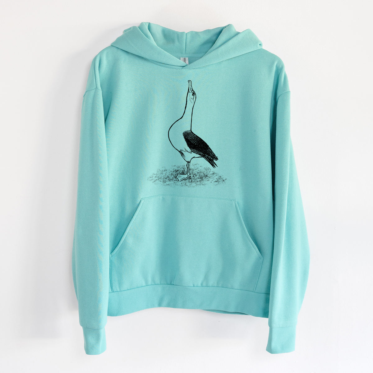 Diomedea exulans - Wandering Albatross - Statement Midweight Hoodie in Seafoam, hanging on a white wall, with a front kangaroo pocket and no drawcords.