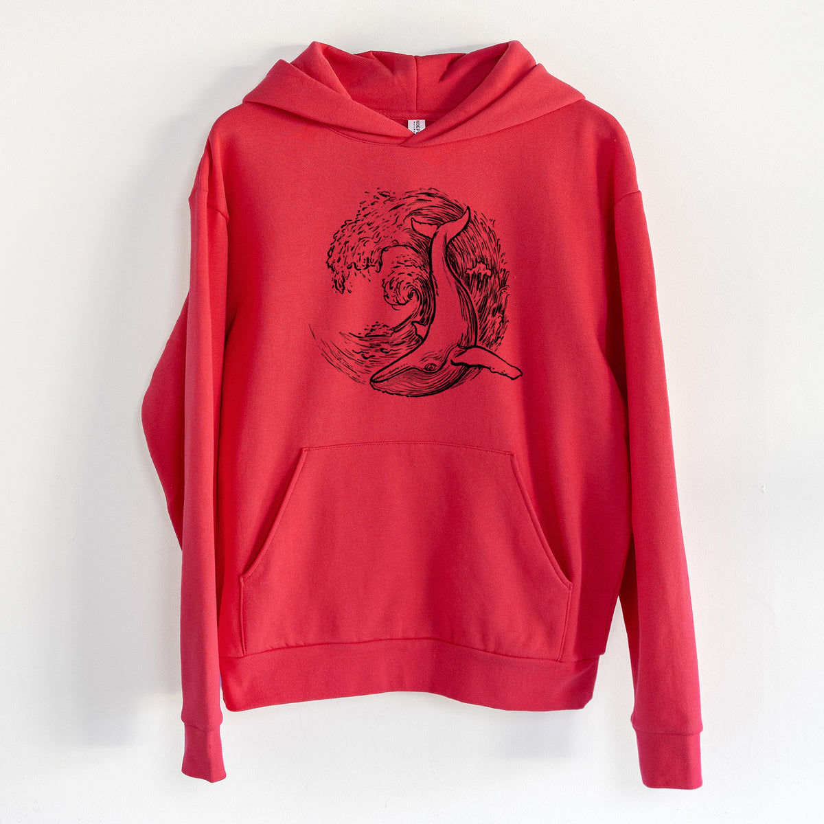 Whale Wave - Statement Midweight Hoodie in Cherry Red, hanging on a white wall, with a front kangaroo pocket and no drawcords.