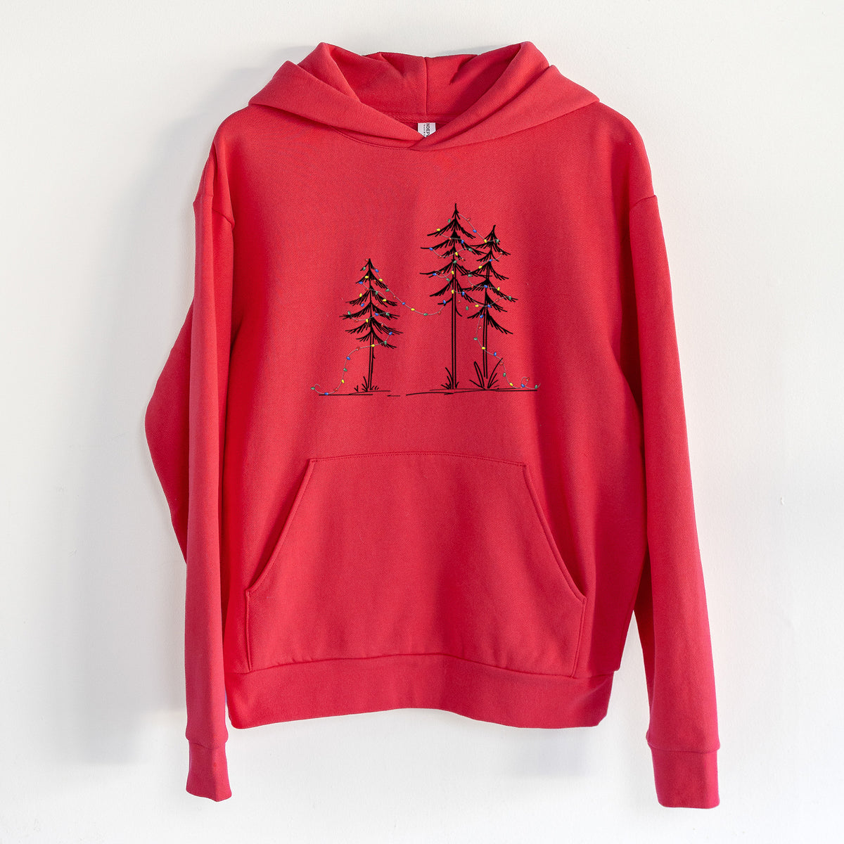 Deck the Pines - Statement Midweight Hoodie in Cherry Red, hanging on a white wall, with a front kangaroo pocket and no drawcords.