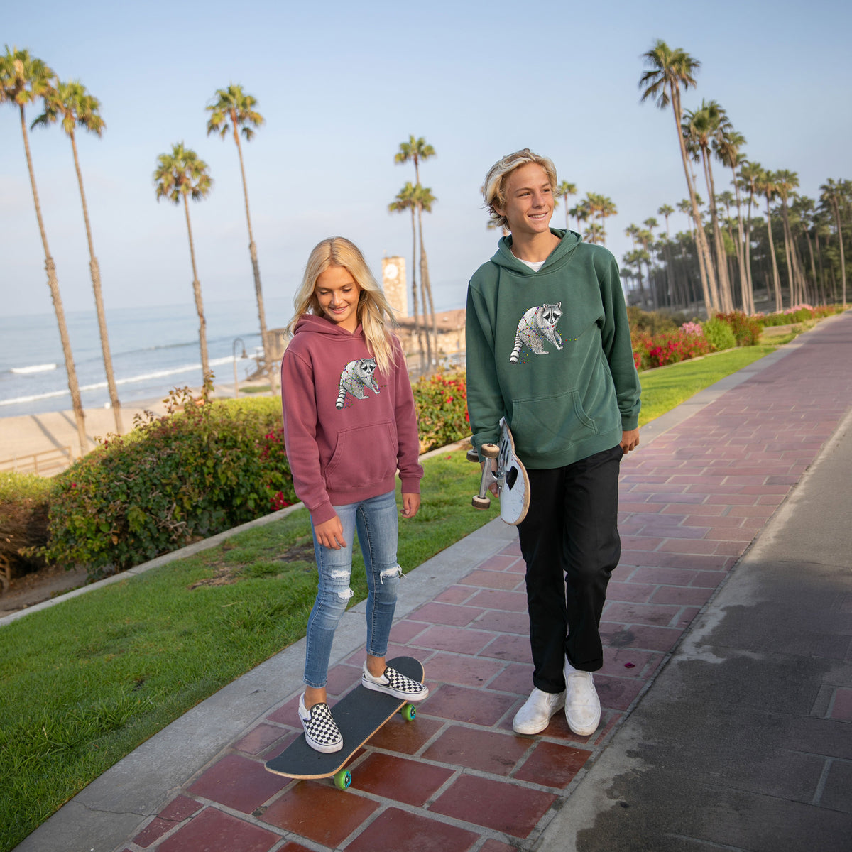 Christmas Raccoon - Youth Pigment Dyed Hoodie, worn by model