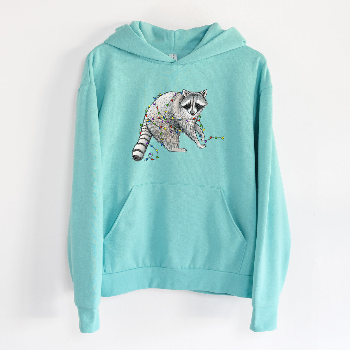 Christmas Raccoon - Statement Midweight Hoodie in Seafoam, hanging on a white wall, with a front kangaroo pocket and no drawcords.
